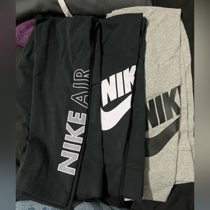 3 pairs of nike leggings